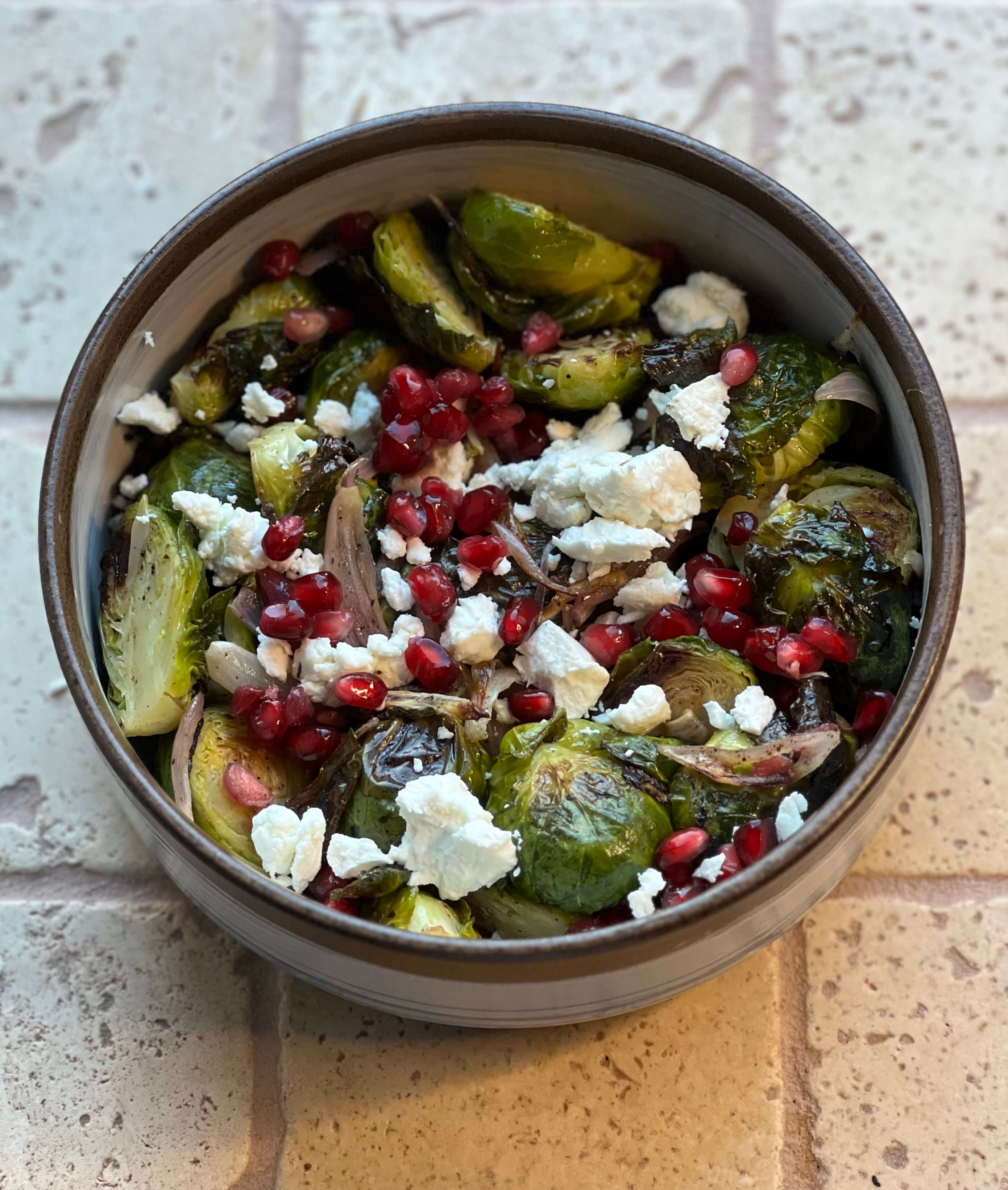 Roasted Brussels Sprouts with Goat Cheese & Pomegranate