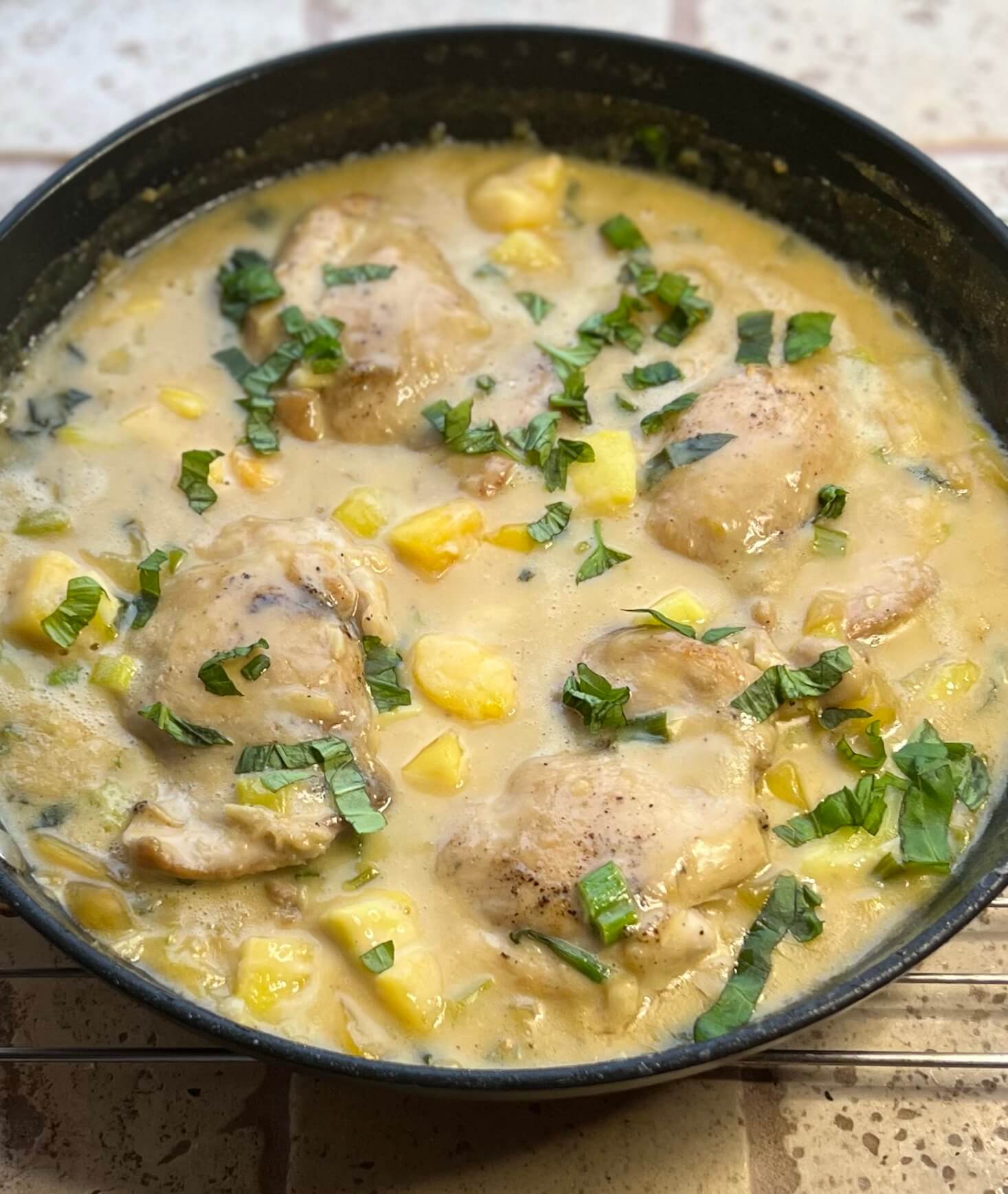 One-Skillet Mango Chicken Thighs with Basil-Coconut Sauce