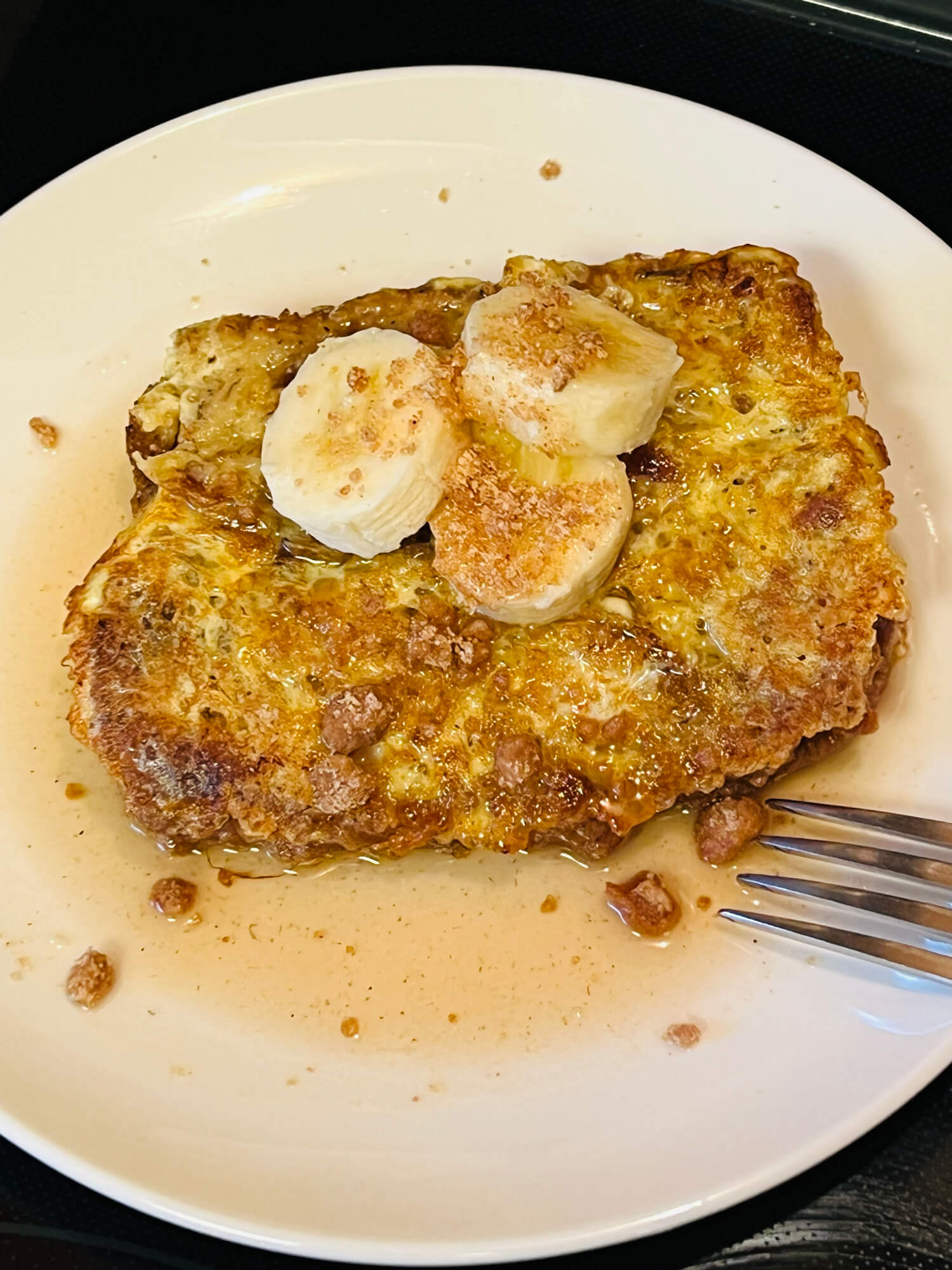 Biscoff Banana Bread French Toast with Banana Syrup and Biscoff Streusel Topping
