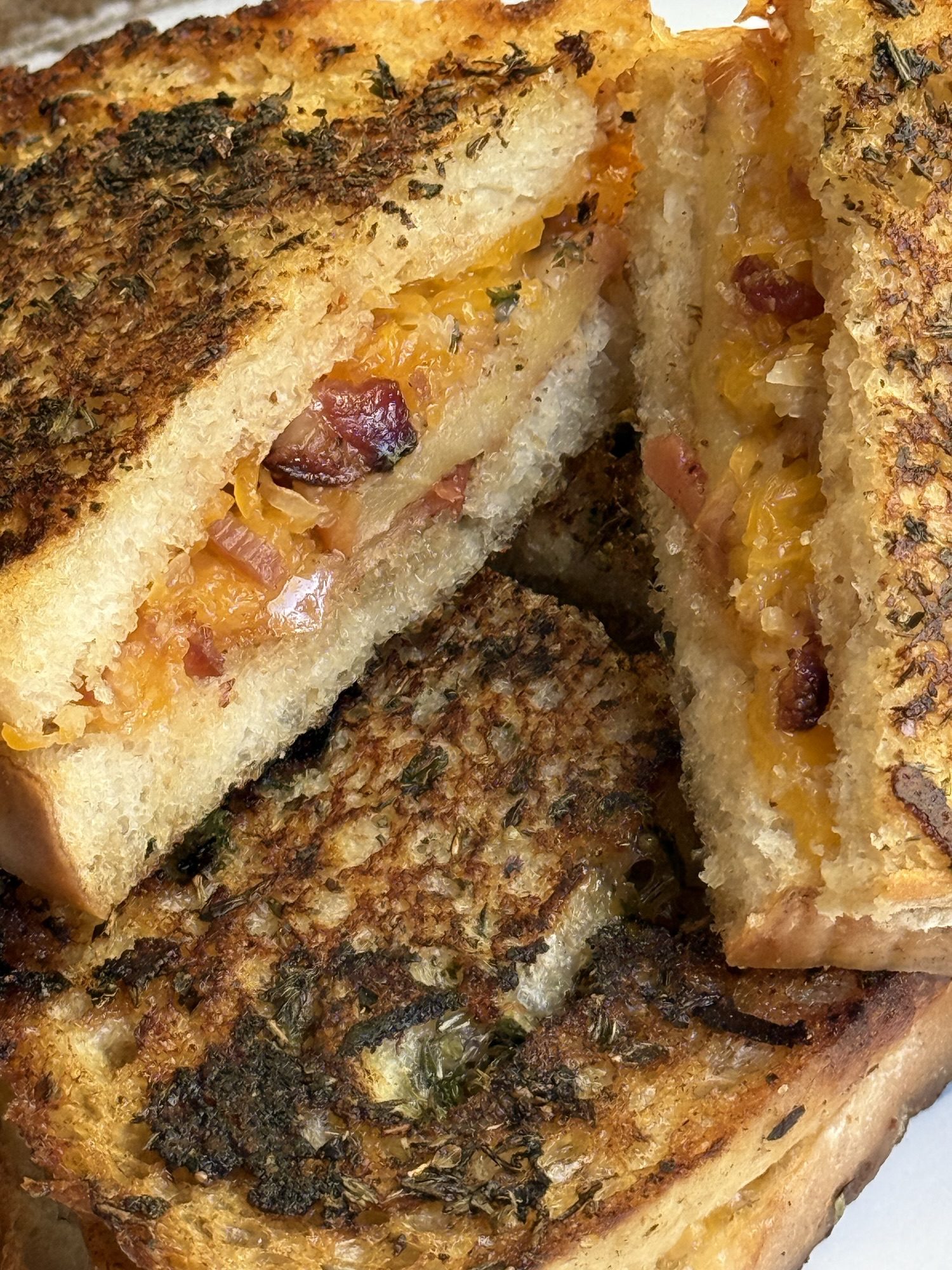 A Symphony of Flavors: Hot Honey Grilled Cheese With Apple Cheddar and Candied Bacon